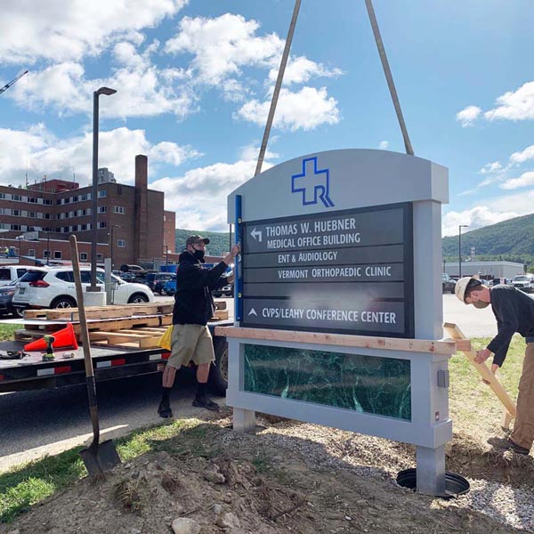 sign being installed
